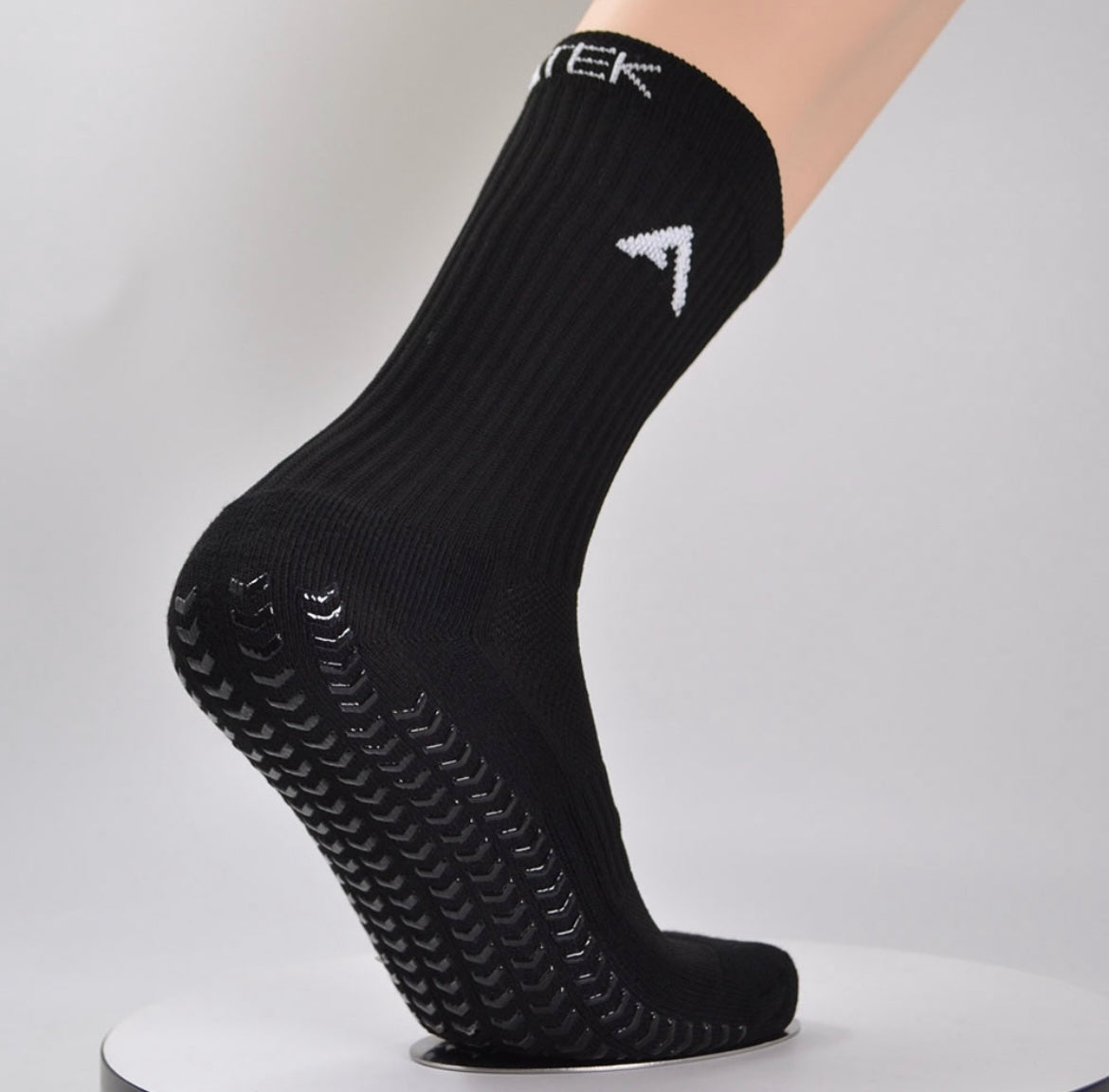 black atek grip sock showing grip